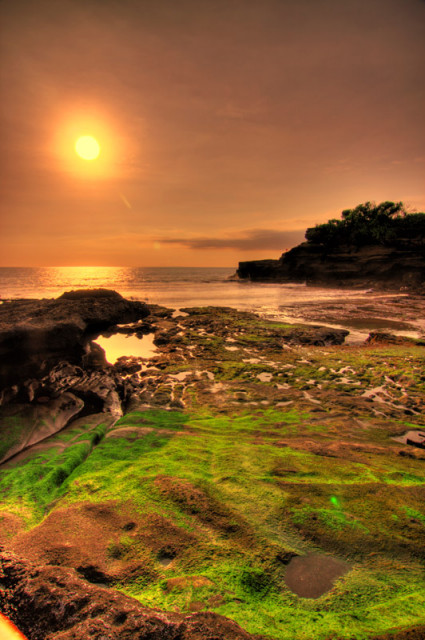 Green rock and the Sun